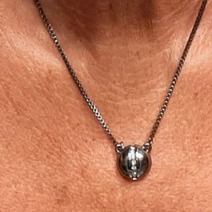 Black necklace w/a row a Swarovski crystals